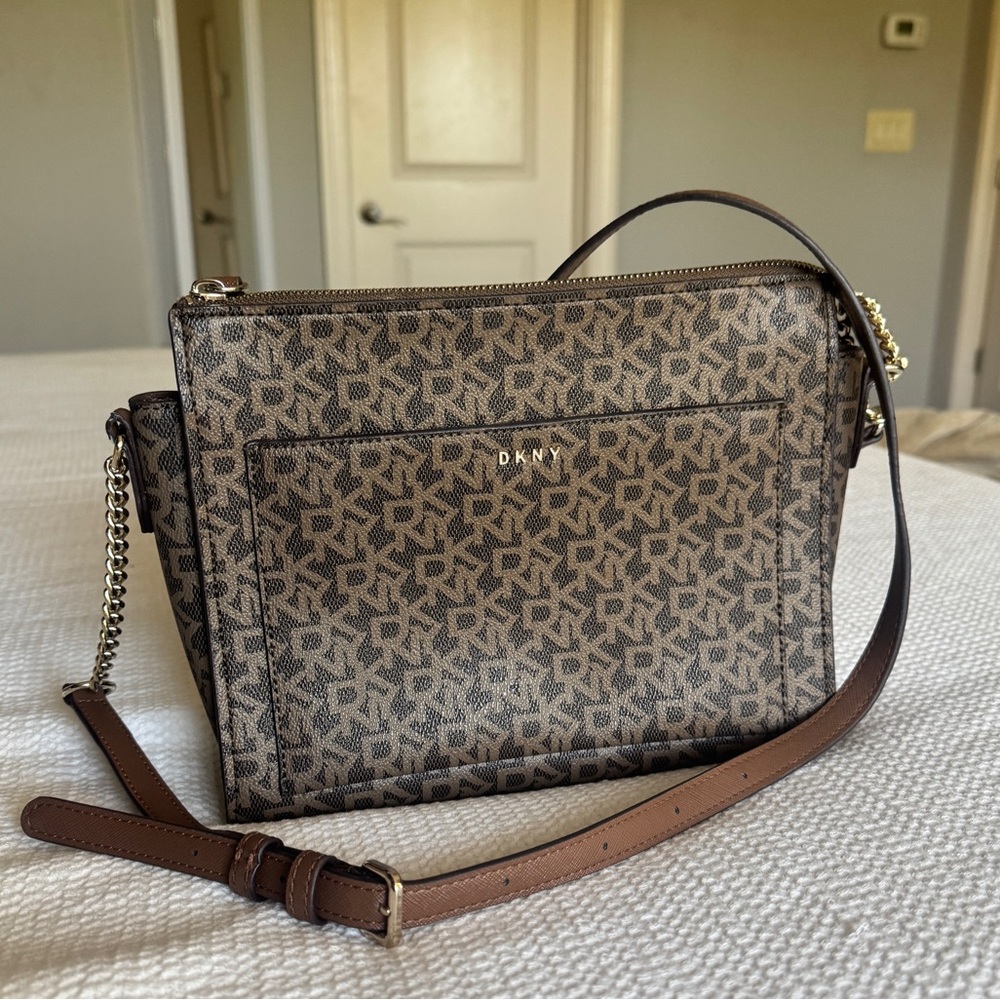 DKNY Monogram Brown Crossbody Purse with chain and leather shoulder strap.